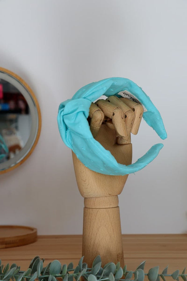 Diadema nudo plumeti turquesa