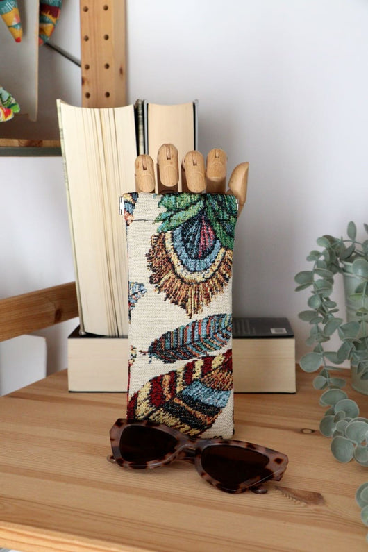 funda gafas plumas 